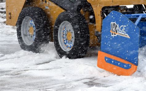 will a tracked skid steer climb snowy driveway|skid steer snow tires vs chain.